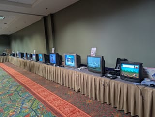 A selection of classic home video game consoles on display